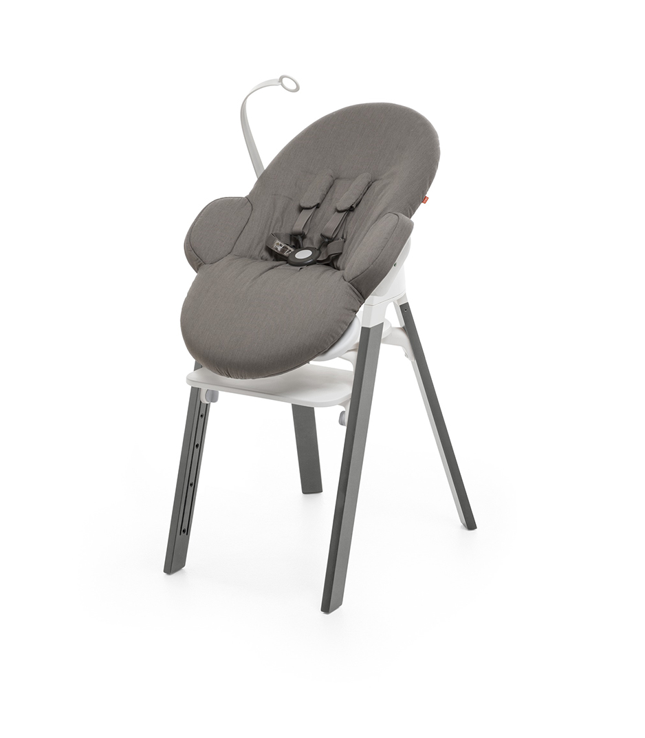 Bouncer, Greige. Mounted on Stokke Steps highchair.